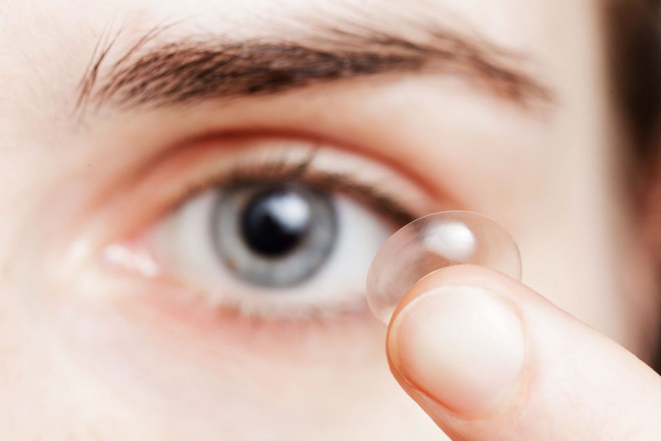 Professional Optometrist — Contact Lens on Finger in Lafayette, IN
