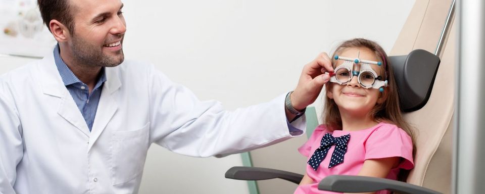 Vision Test — Doctor Vision Testing a Kid in Lafayette, IN