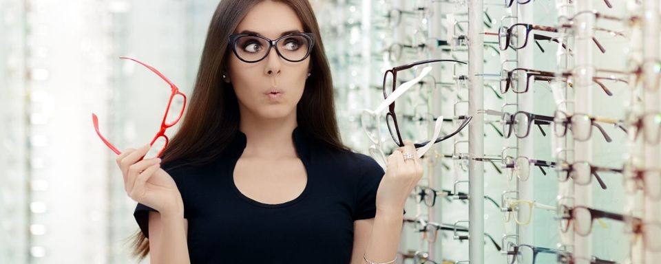 Glass Frames — Woman Choosing Frames for Lens in Lafayette, IN