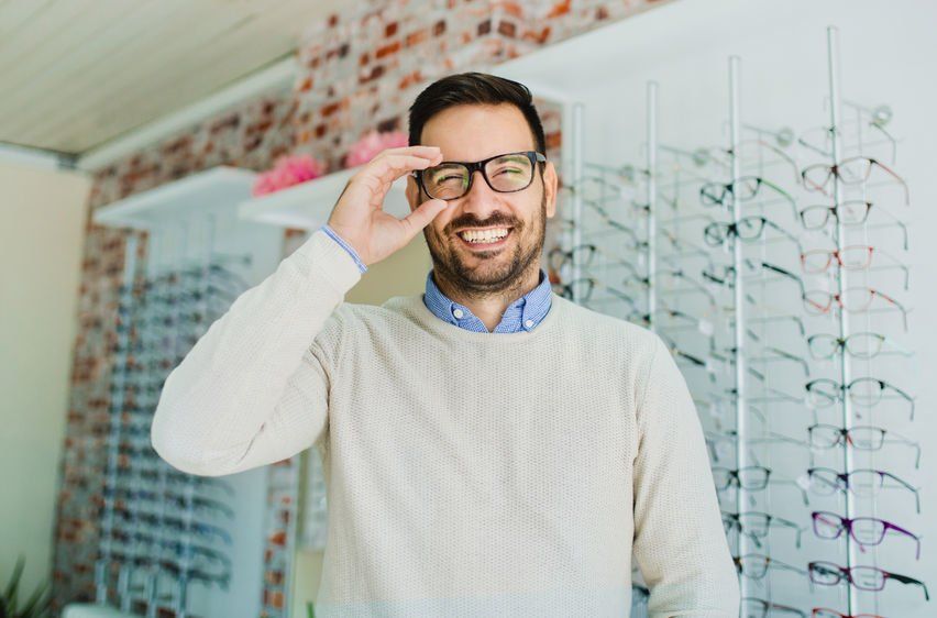 Replacement Glasses — Man Smiling With New Glasses in Lafayette, IN