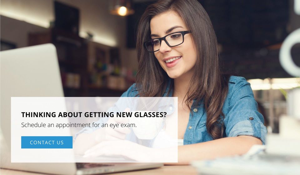 Optometrist — Woman Using Laptop Wearing Glasses in Lafayette, IN