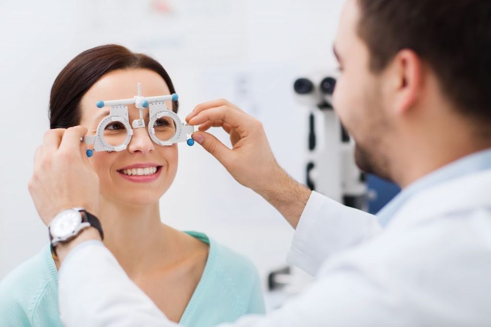 Professional Eye Care Team — Woman Smiling in Lafayette, IN