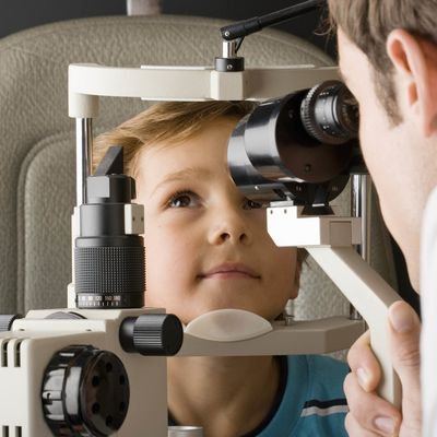 A patient taking one of our eye exams in Lafayette, IN