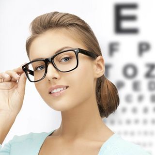 Eyewear — Woman Wearing Safety Glasses in Lafayette, IN