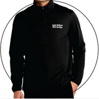 A man is wearing a black jacket with the word bridge on it.