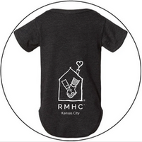 A black baby onesie with the rmhs kansas city logo on the back