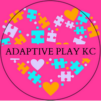 A logo for adaptive play kc with puzzle pieces and hearts