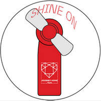A red fan with the words shine on written on it