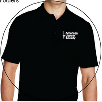 A man wearing a black polo shirt that says american cancer society