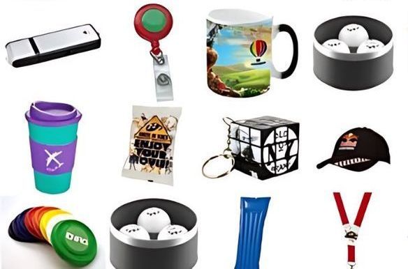 A variety of promotional items including a mug with a picture of a hot air balloon on it