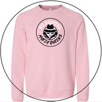 A pink sweatshirt with a black logo on it is in a circle.