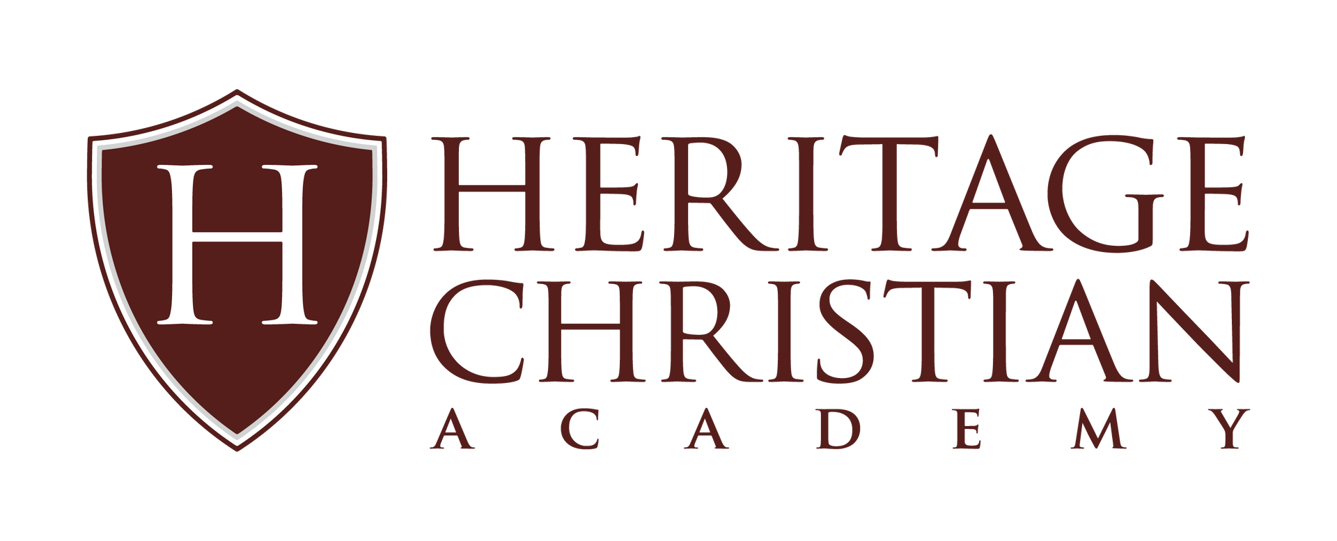 The logo for heritage christian academy has a shield on it