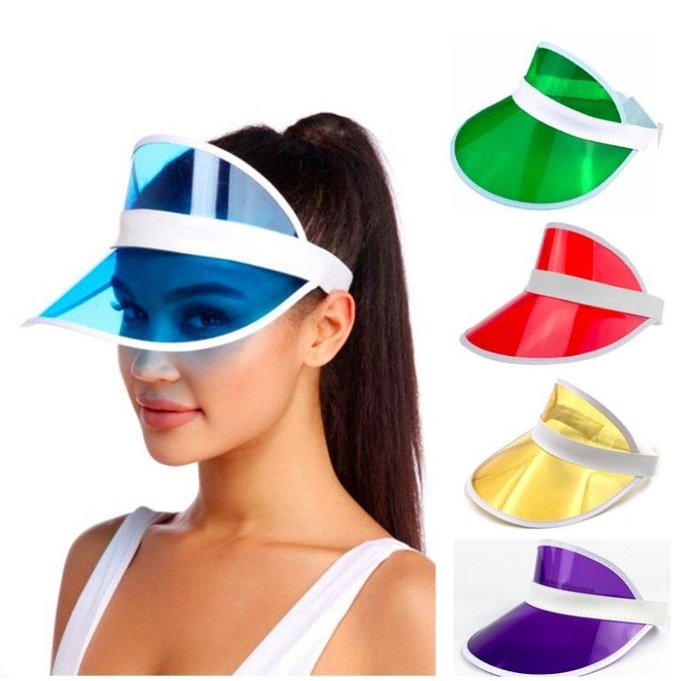 A woman wearing a visor with different colors on it