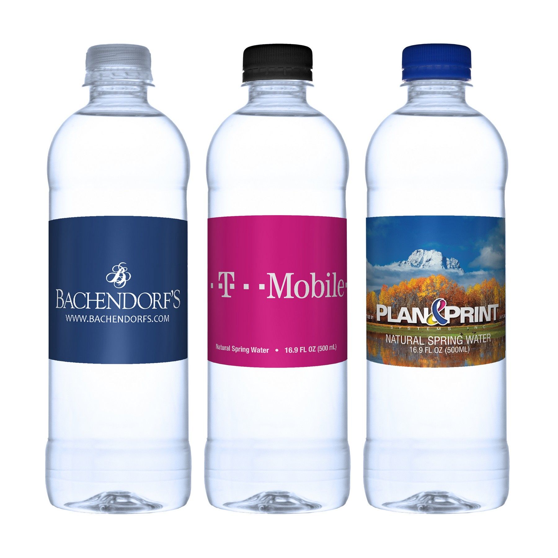 Three bottles of water with different labels on them.