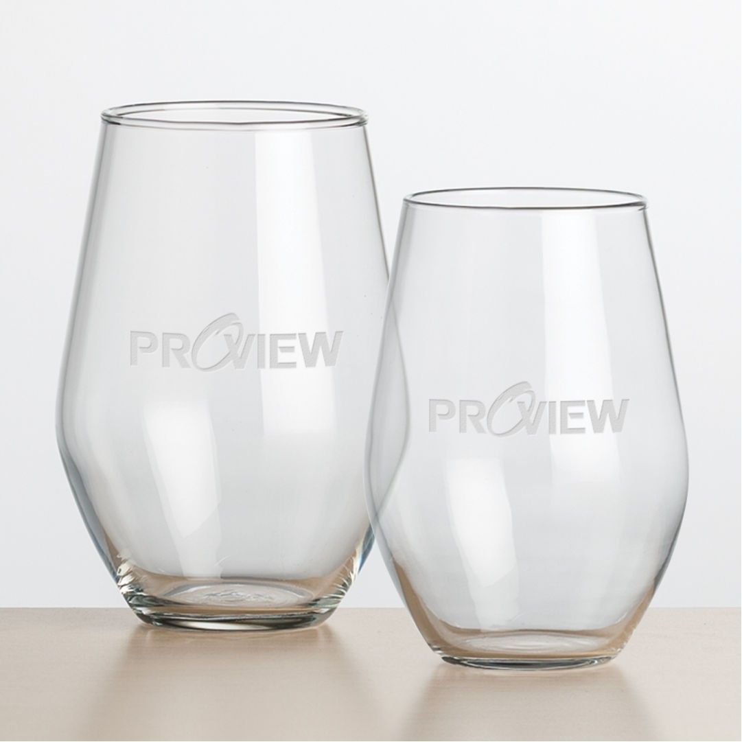 Two wine glasses with the word proview etched on them