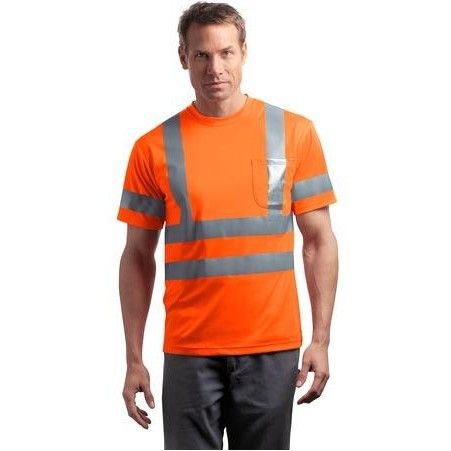 A man is wearing an orange safety shirt with reflective stripes.