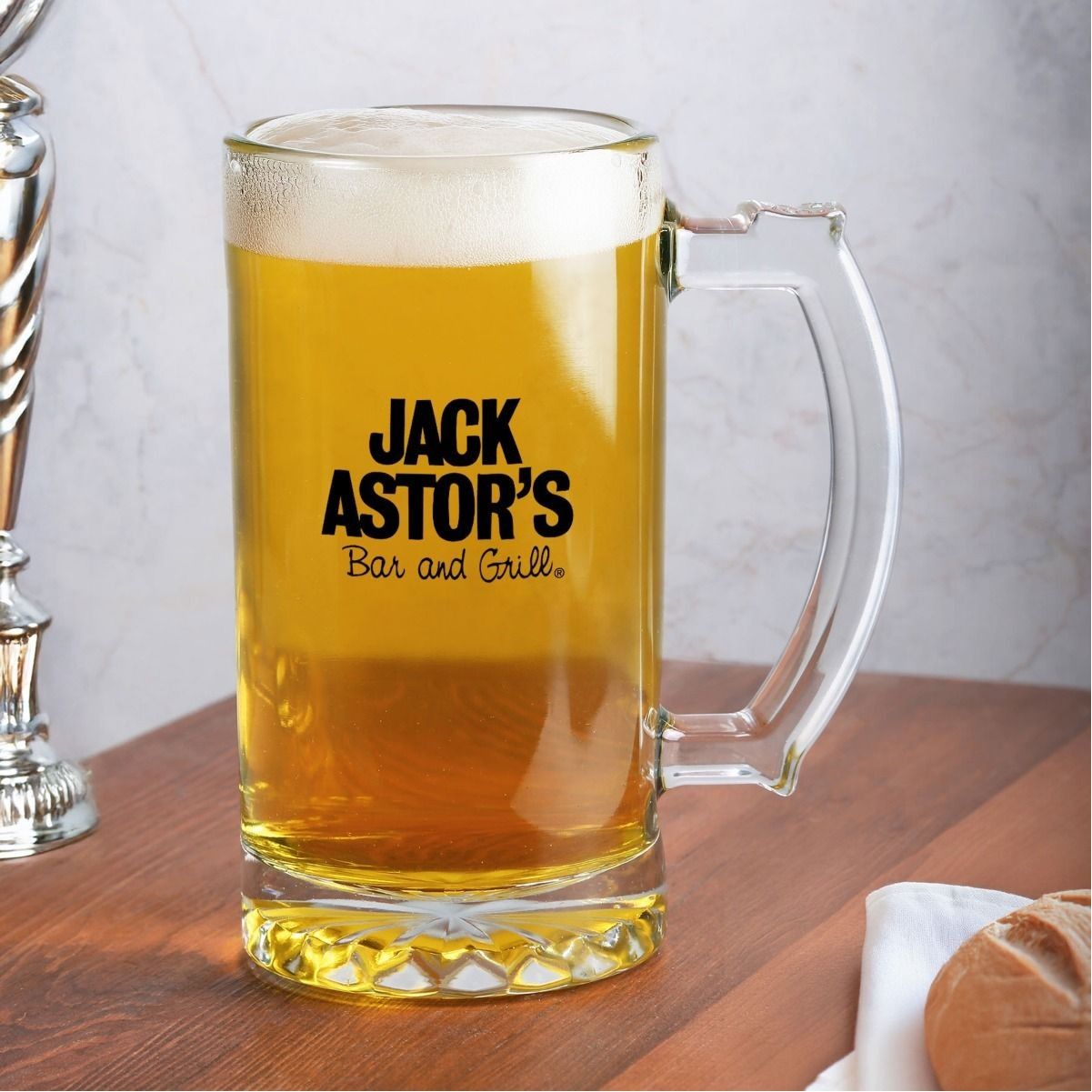 A beer mug that says jack astor 's bar and grill
