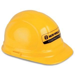 A yellow hard hat that says new holland construction on it