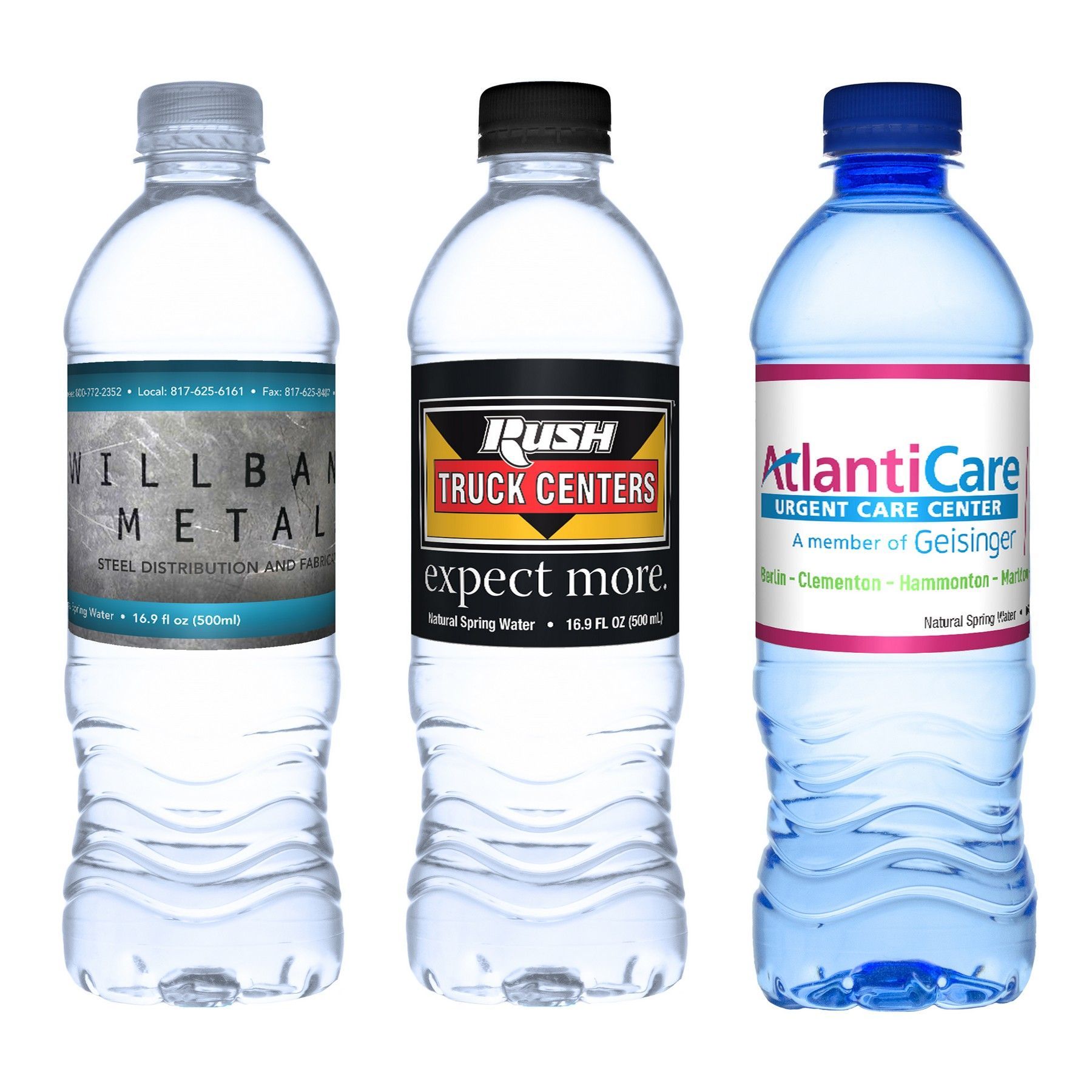 Three bottles of water one of which says expect more