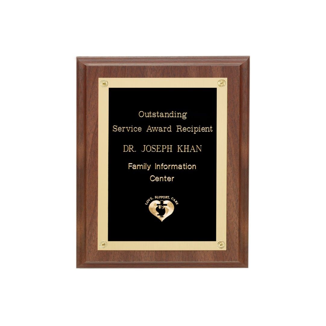A wooden plaque that says outstanding service award recipient