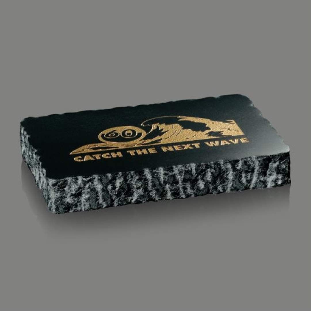 A black and gold business card with the words `` catch the next wave '' on it.