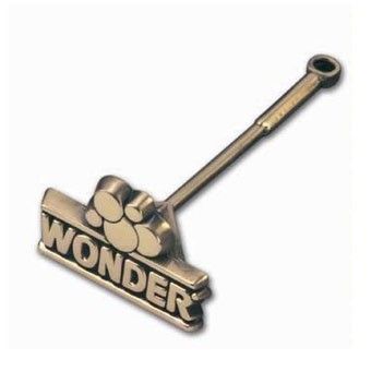 A metal pin with the word wonder on it