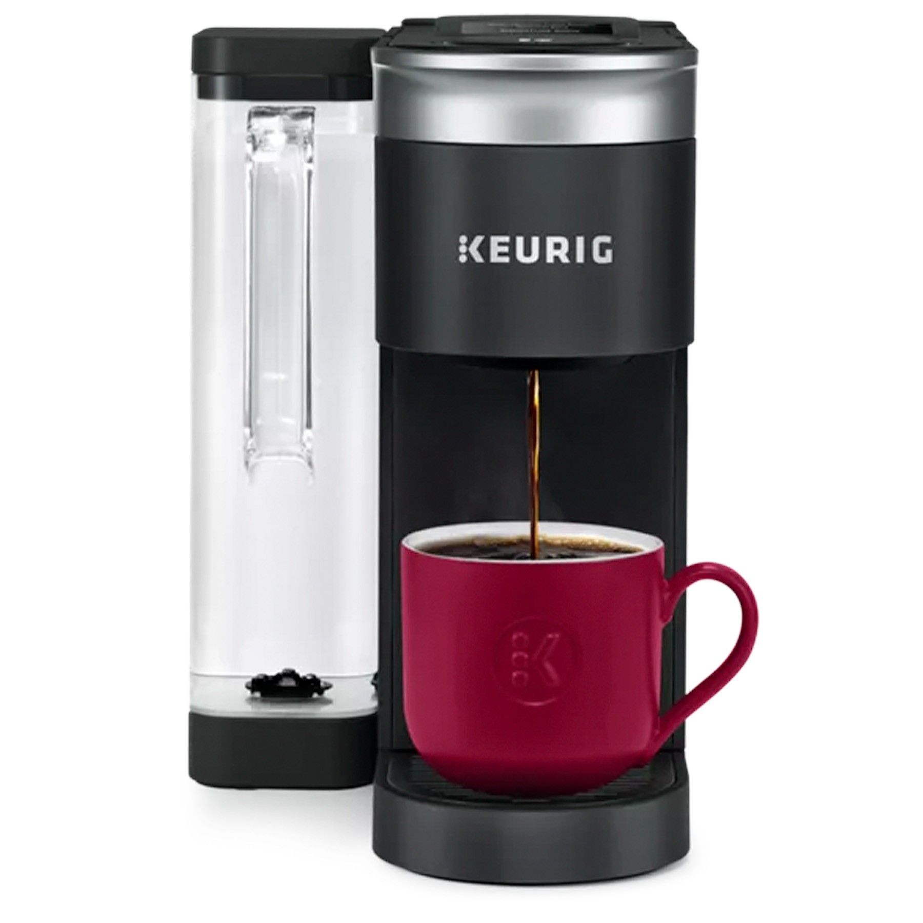 A keurig coffee maker is pouring coffee into a red cup.