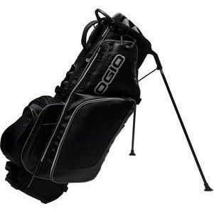 A black ogio golf bag is sitting on a stand.
