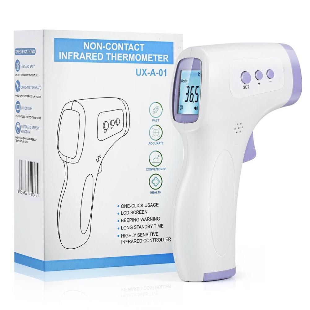 A non-contact infrared thermometer is sitting next to its box.