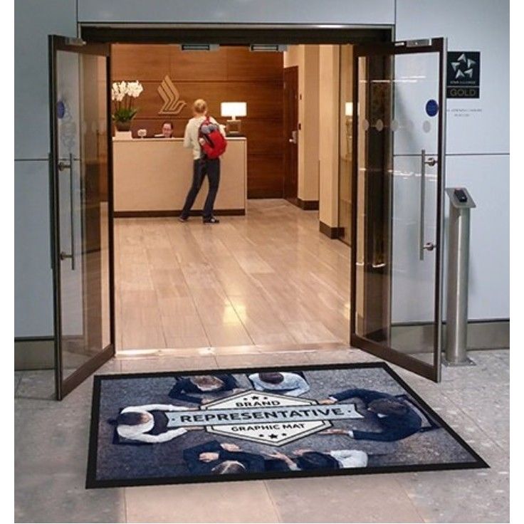A person standing in front of a door that says representative