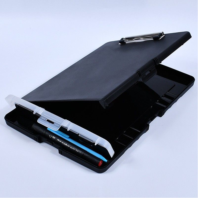 A black clipboard with a pen inside of it