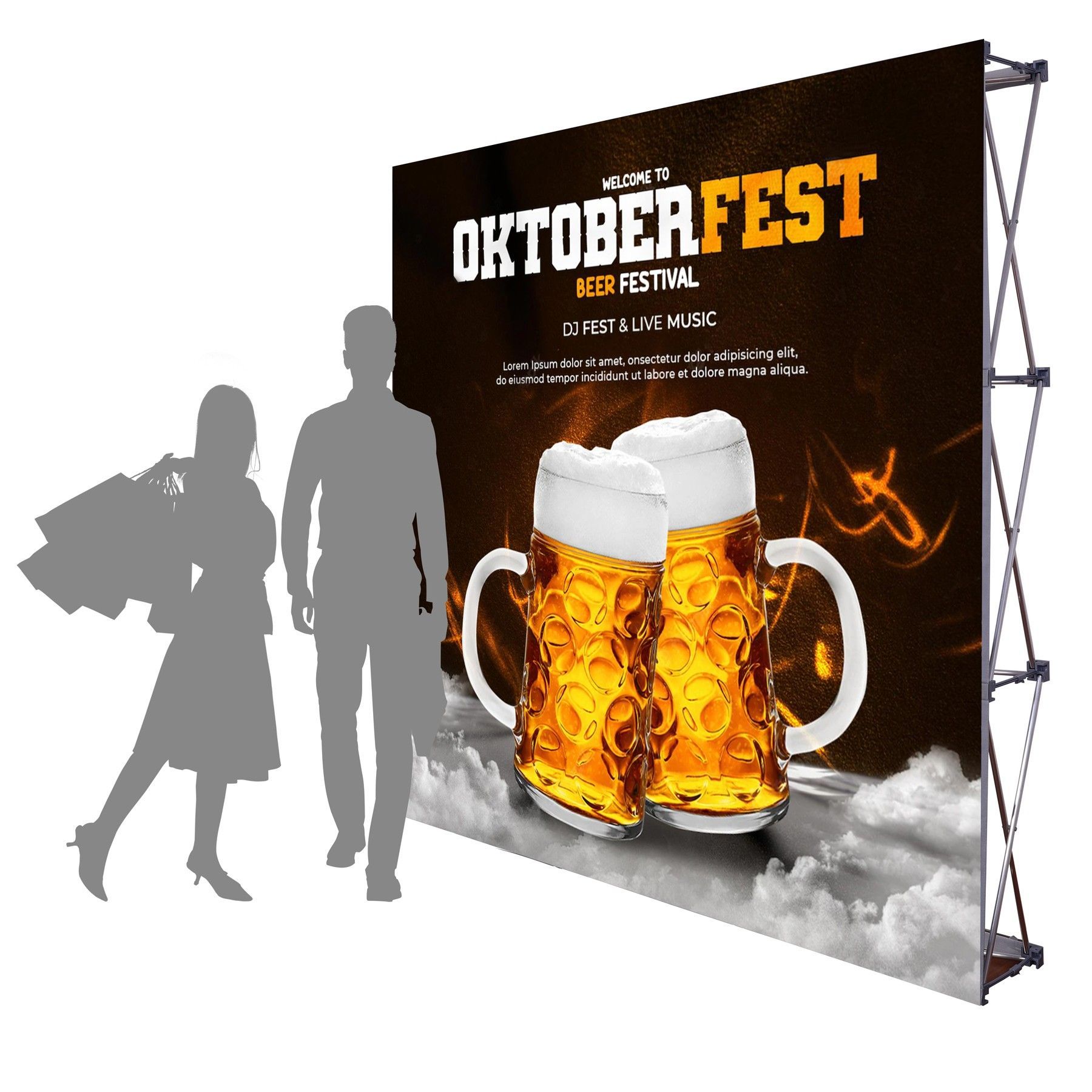 A man and a woman are standing in front of a large sign that says oktoberfest
