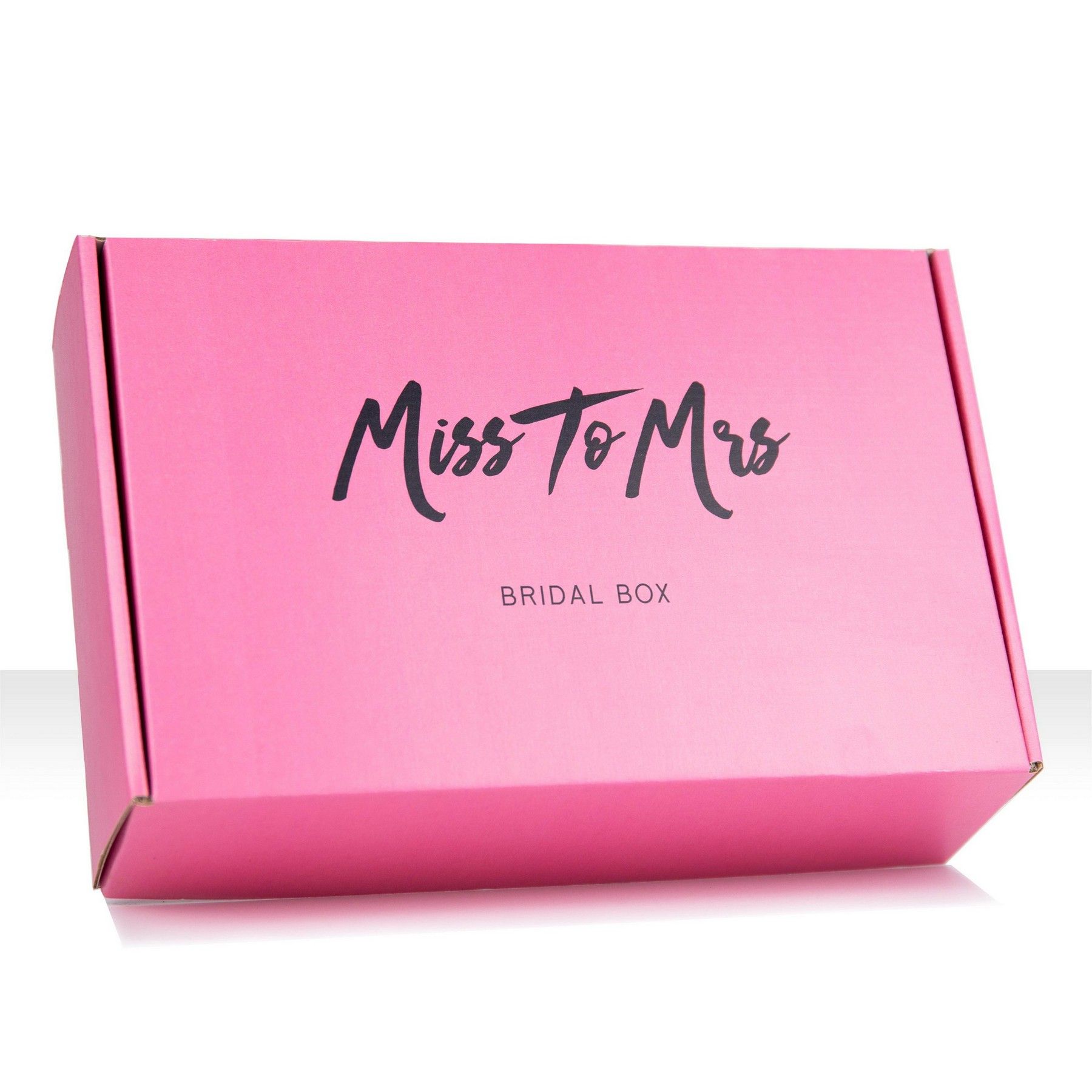 A pink box with the words `` miss to mrs '' written on it.