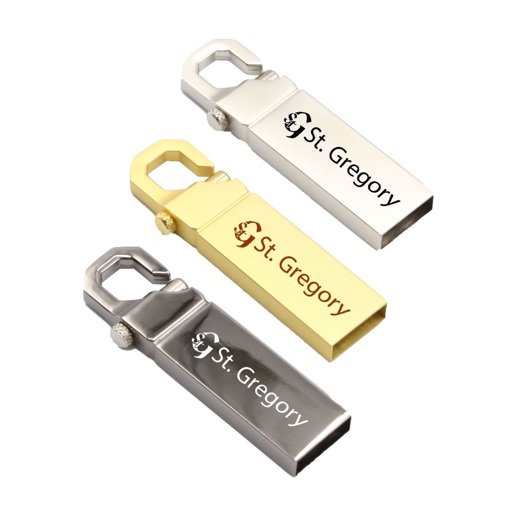 Three different colored usb flash drives with the name st. gregory on them