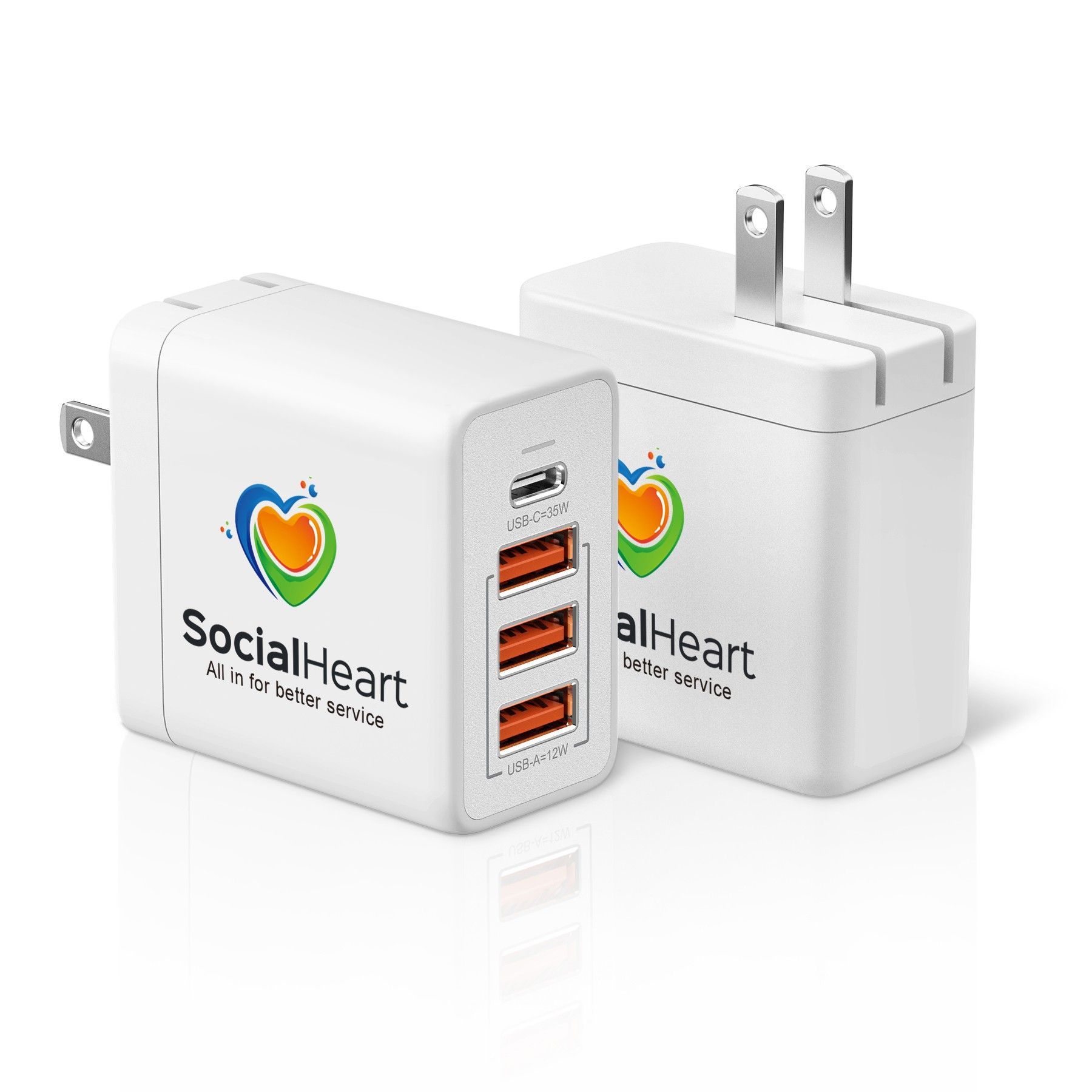 Two white chargers with a heart on them are sitting next to each other on a white surface.