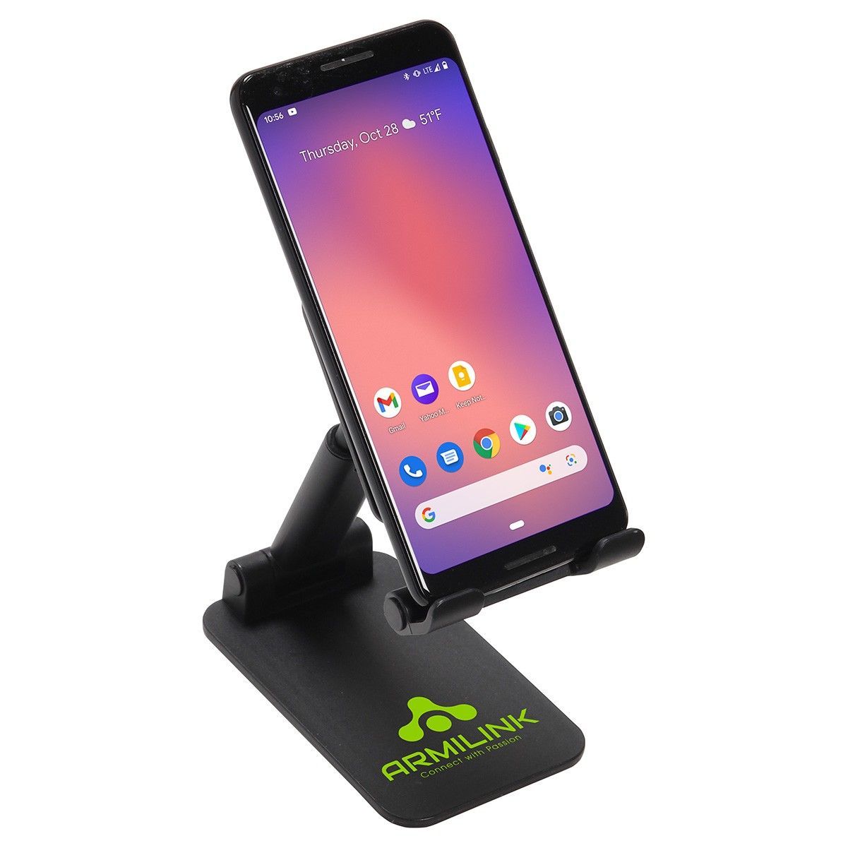 A cell phone is sitting on top of a cell phone stand.
