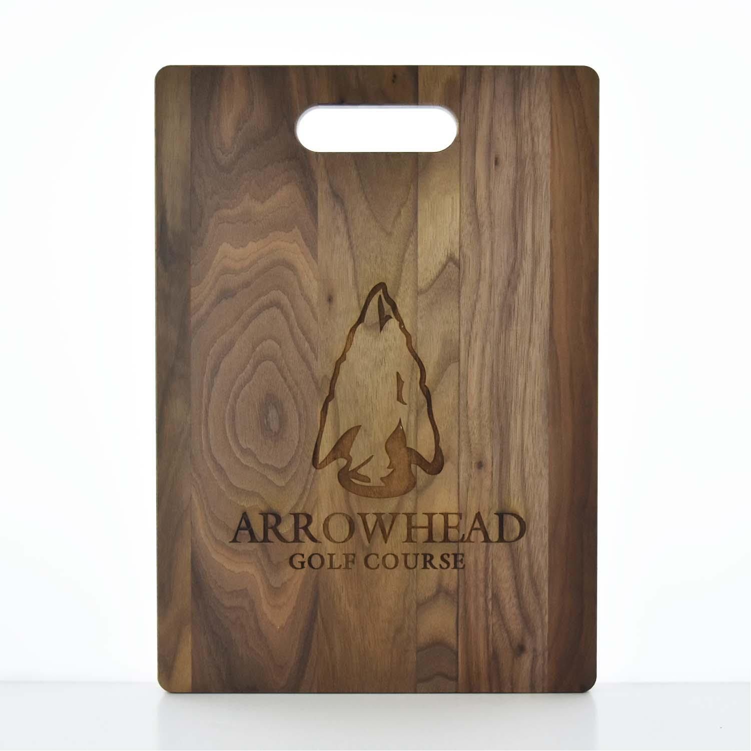 A wooden cutting board for the arrowhead golf course