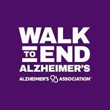 The walk to end alzheimer 's association logo is on a purple background.