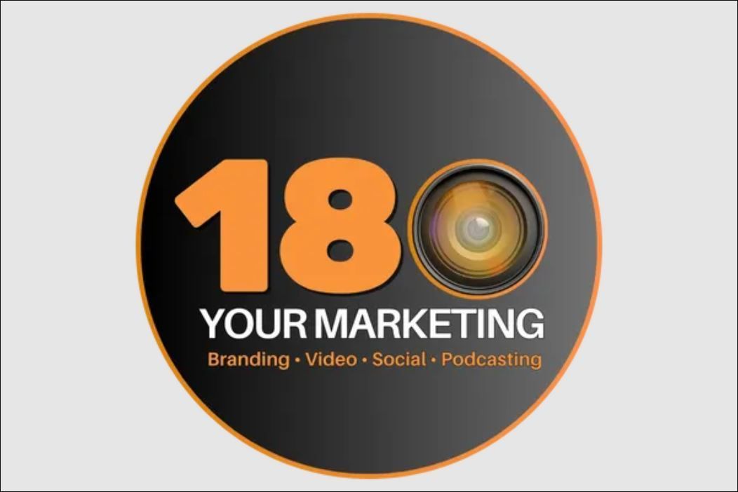 A black and orange logo for 180 your marketing