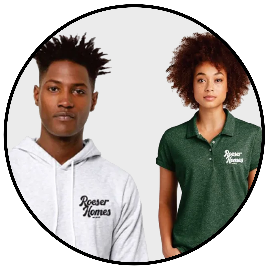A man in a white hoodie and a woman in a green polo shirt