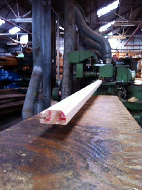 timber beam being cut