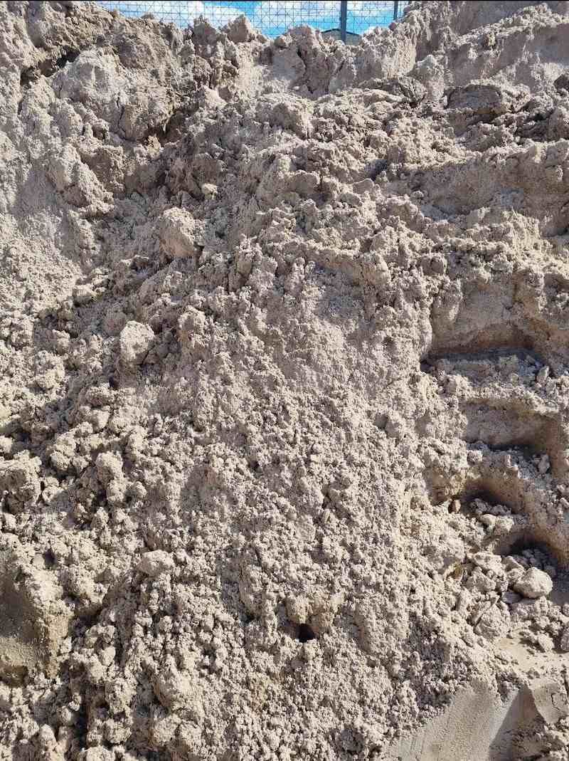 A Pile Of Sand Is Sitting On Top Of A Pile Of Dirt — Campbell's Truck and Bobcat and Landscape Supplies In Gympie, QLD