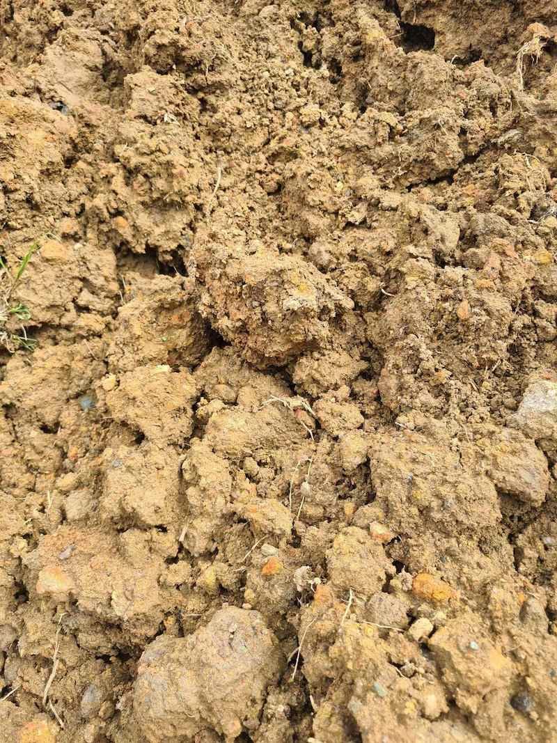 A Close Up Of A Pile Of Dirt On The Ground — Campbell's Truck and Bobcat and Landscape Supplies In Gympie, QLD