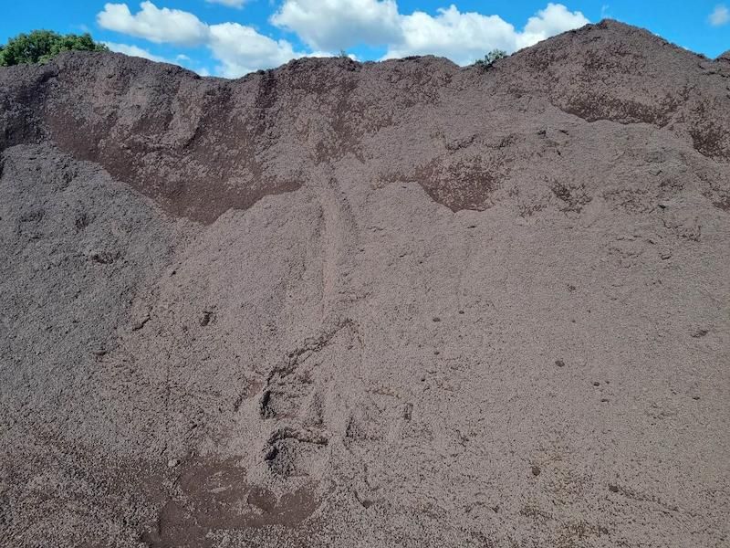 A Pile Of Dirt With A Blue Sky In The Background — Campbell's Truck and Bobcat and Landscape Supplies In Gympie, QLD