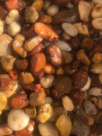 A Close Up of a Pile of Rocks and Mulch in a Garden — Campbell's Truck and Bobcat and Landscape Supplies In Gympie, QLD