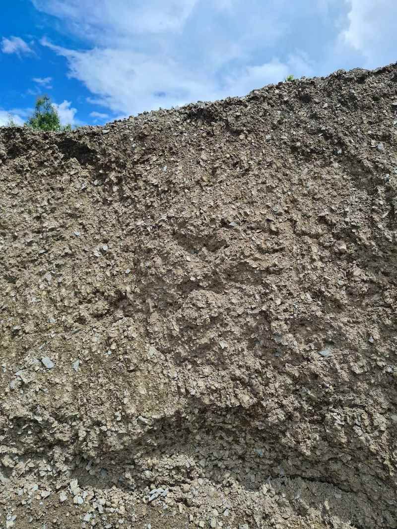 A Large Pile Of Dirt Is Sitting On Top Of A Hill — Campbell's Truck and Bobcat and Landscape Supplies In Gympie, QLD