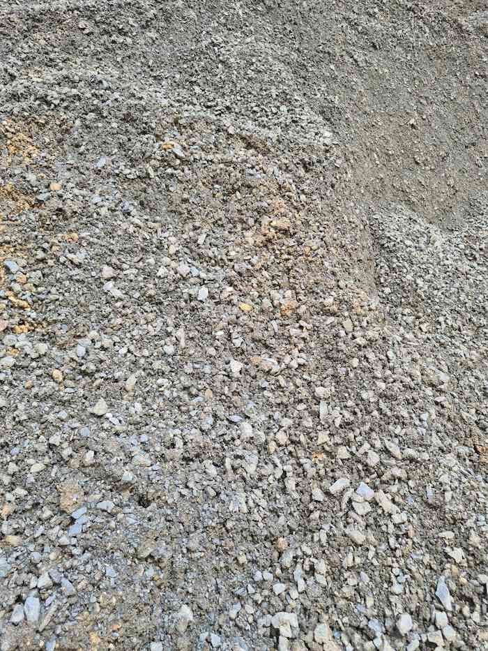 A Pile Of Gravel Is Sitting On The Ground — Campbell's Truck and Bobcat and Landscape Supplies In Gympie, QLD