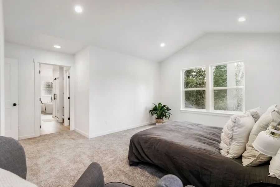 There is a large bed in the middle of the room.