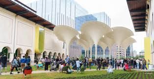 Interior of the Blanton Museum of Art with visitors viewing various exhibits.