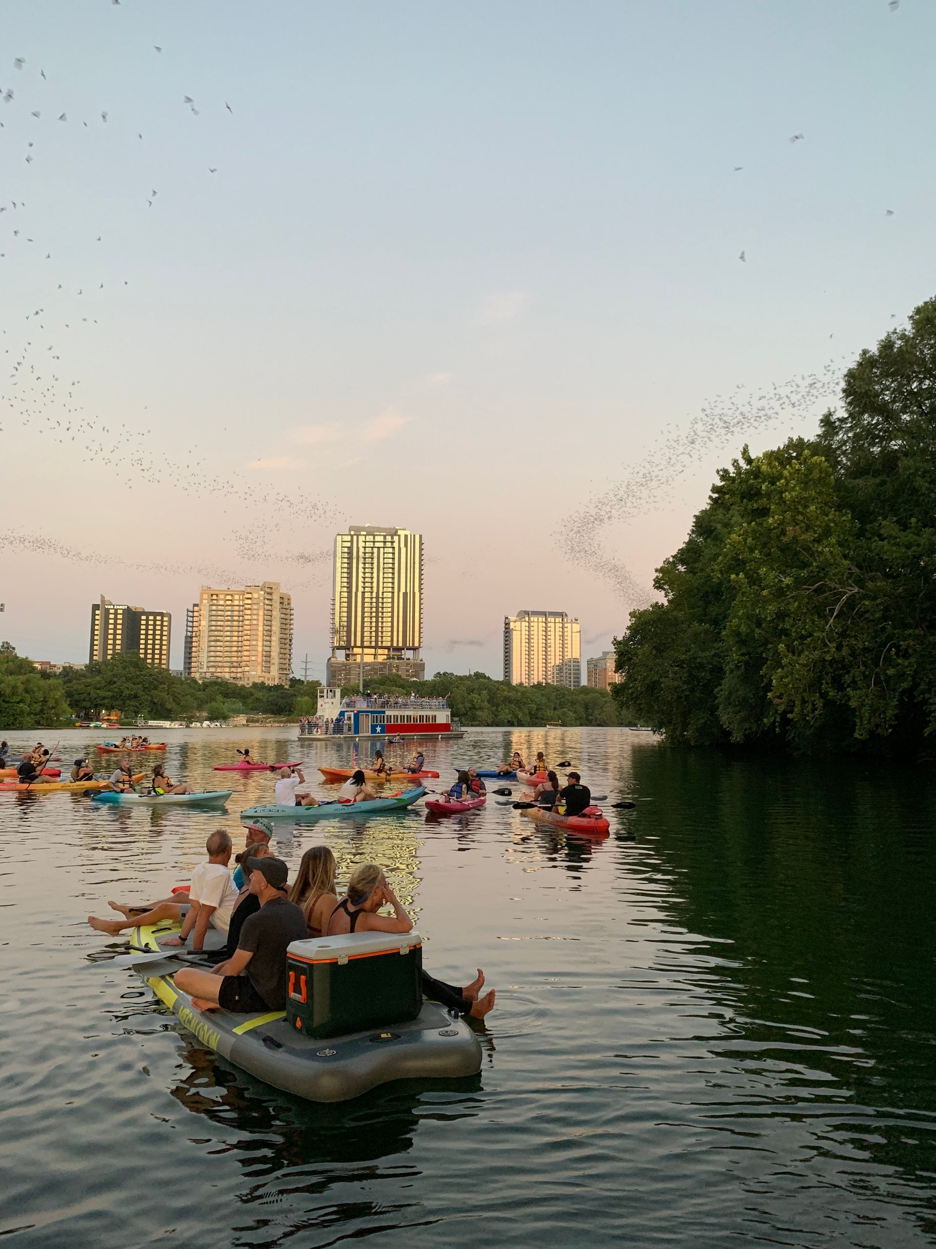 Paddleboarding on Lady Bird Lake with Austin skyline in the background